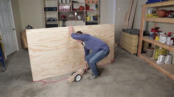 How do you carry plywood alone?