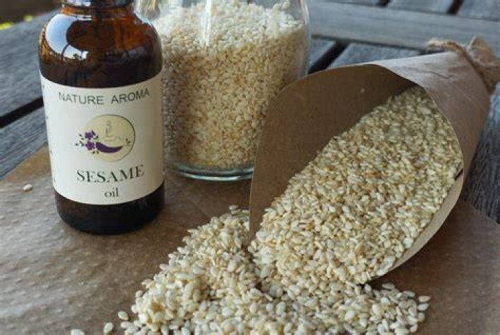 How do you extract sesame oil manually?