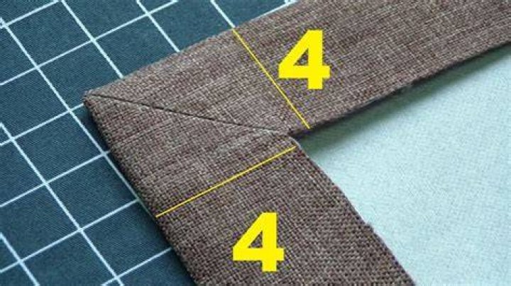How do you make a mitred corner hem?