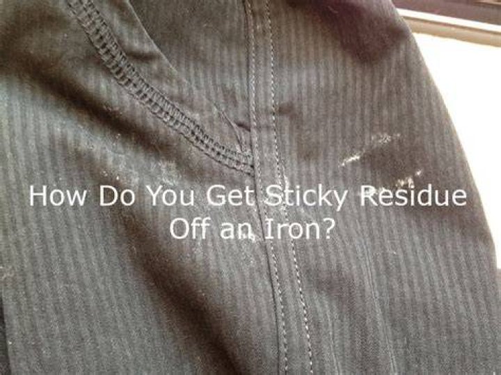 How do you remove sticky residue from an iron?