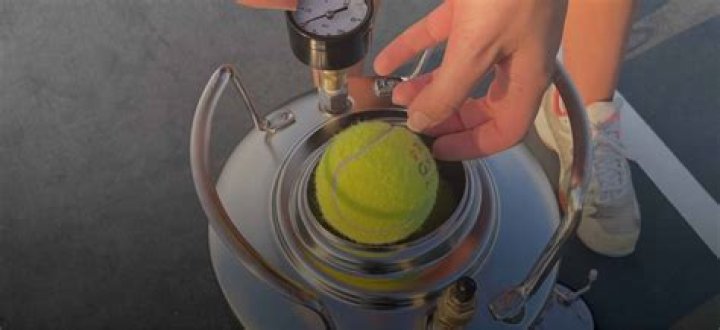 What is the pressure inside a tennis ball?